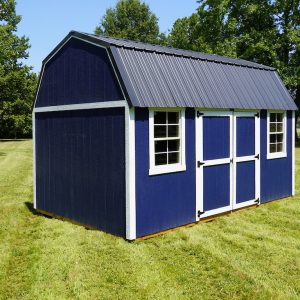 A striking Navy blue Premier Side Lofted Barn shed with white trim and a dark metal roof, featuring double doors and two windows on a lush green lawn under a clear sky.