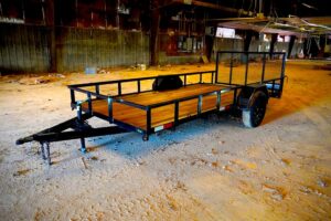 Image of a Trailers by Premier 6x14 Dovetail Utility Trailer with a single axle and a 3ft Ramp.